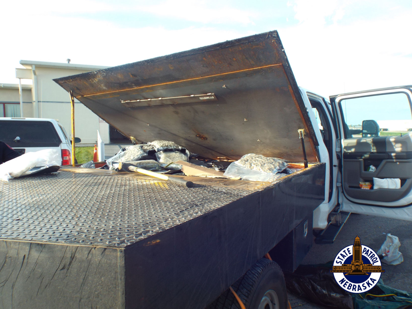 250 pounds of marijuana in fake compartment